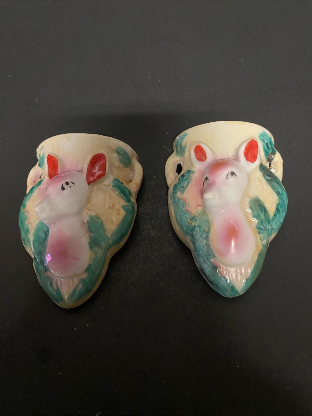 Vintage ceramic wall pockets featuring deer on them. Set of 2,